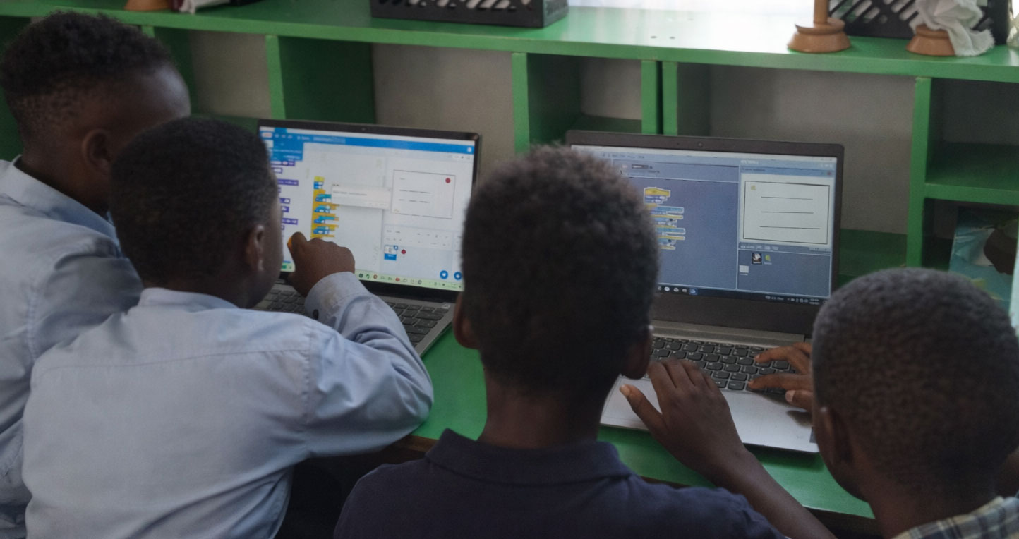 Students learning robotics in a school activity